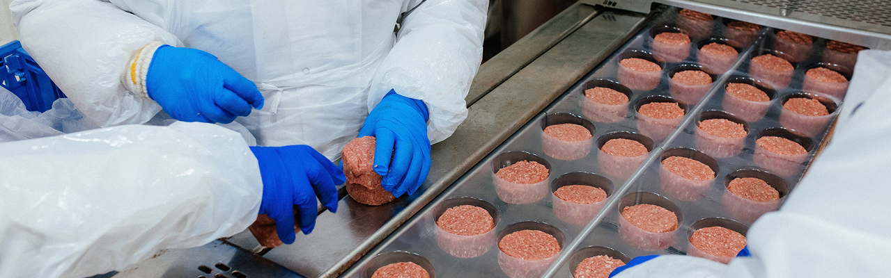 workers in a hamburger plant